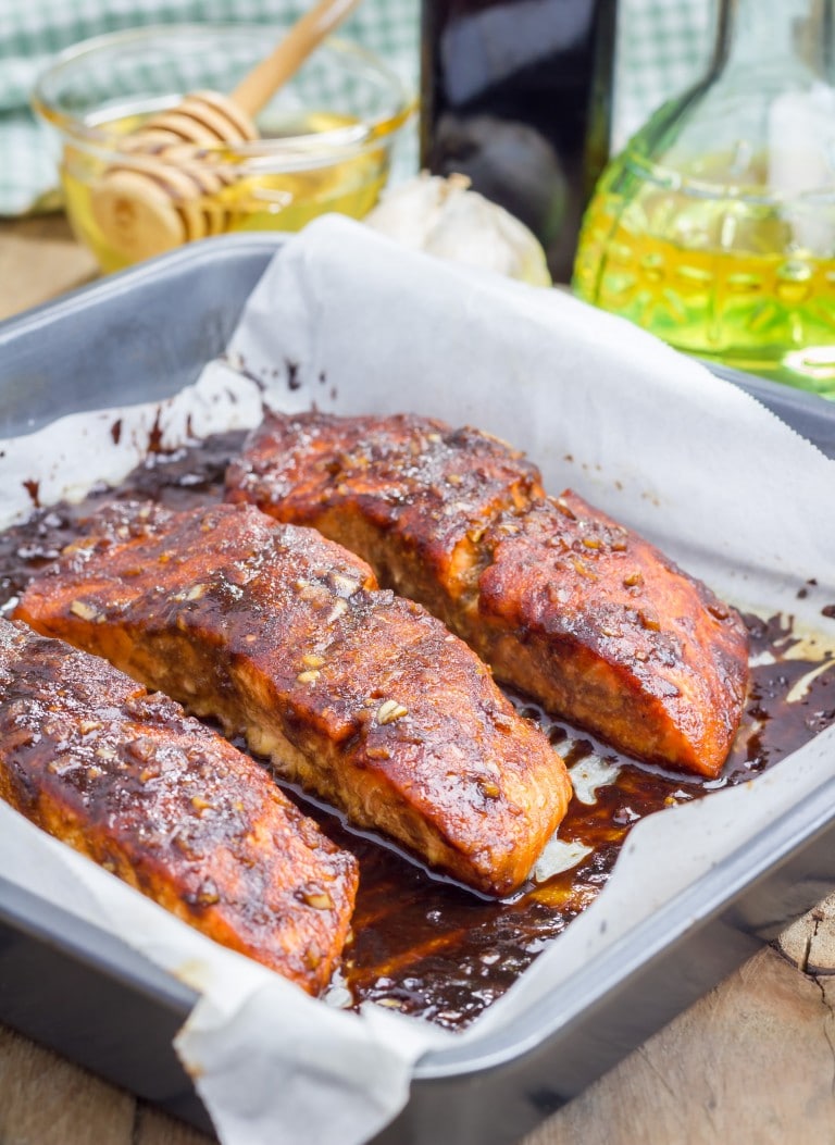 Salmon fillet with balsamichoney sauce in baking dish, baked