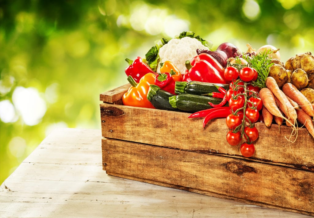 Farm fresh vegetables in a wooden crate – Versatile Vinegar