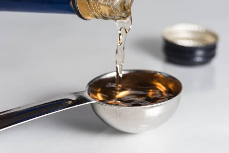 Sherry pouring into a tablespoon Versatile Vinegar